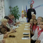 В Центре общения старшего поколения города Лузы состоялась встреча священника с жителями